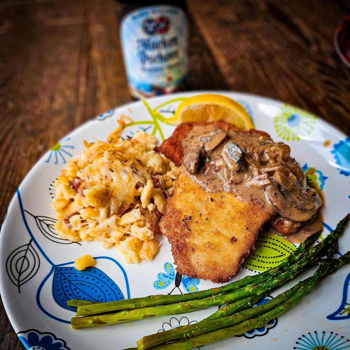 Pork schnitzel with a Jager sauce, asparagus, and cheese spätzle. 