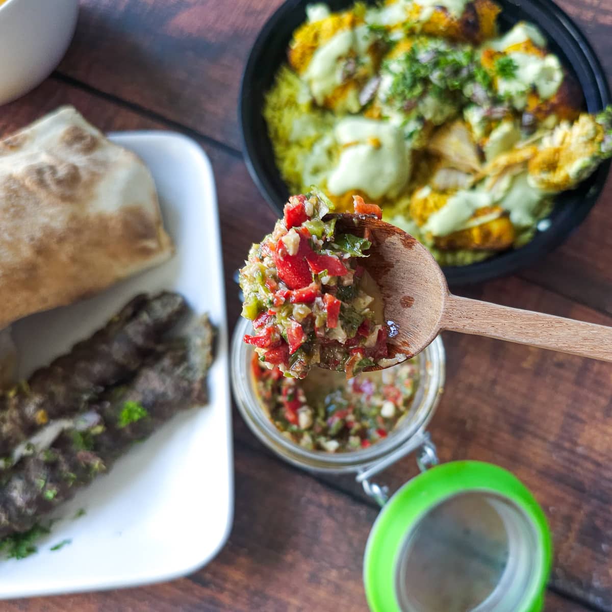 Palestinian shatta sauce with kefta, shawarma, and shish tawouk.