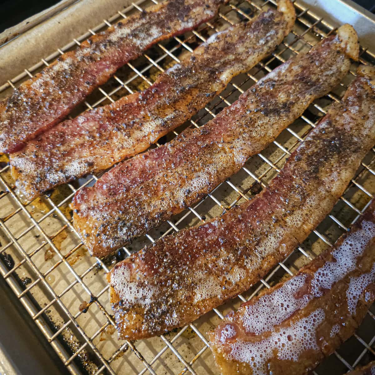 Cooked Bloody Mary seasoned bacon.