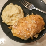 Chicken Kiev with fresh herb butter served with mashed potatoes.