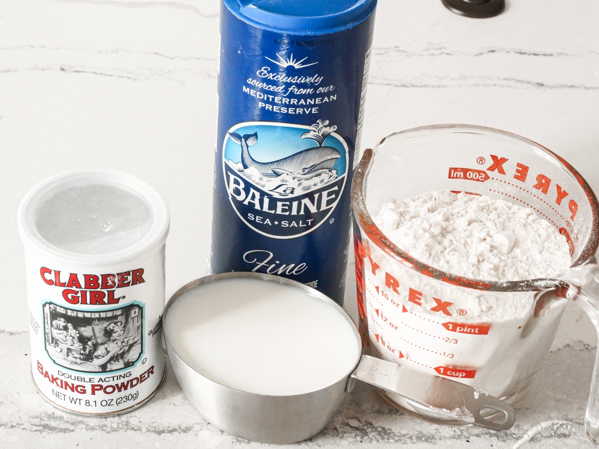 Baking powder, milk, flour, and salt for fry bread recipe.