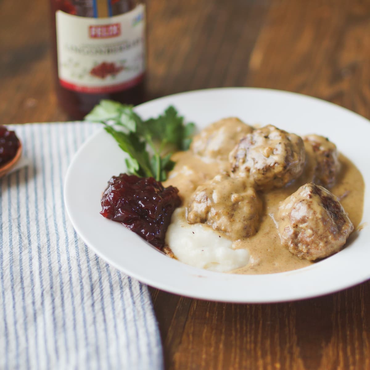Swedish meatball served with lingonberries and mashed potatoes.