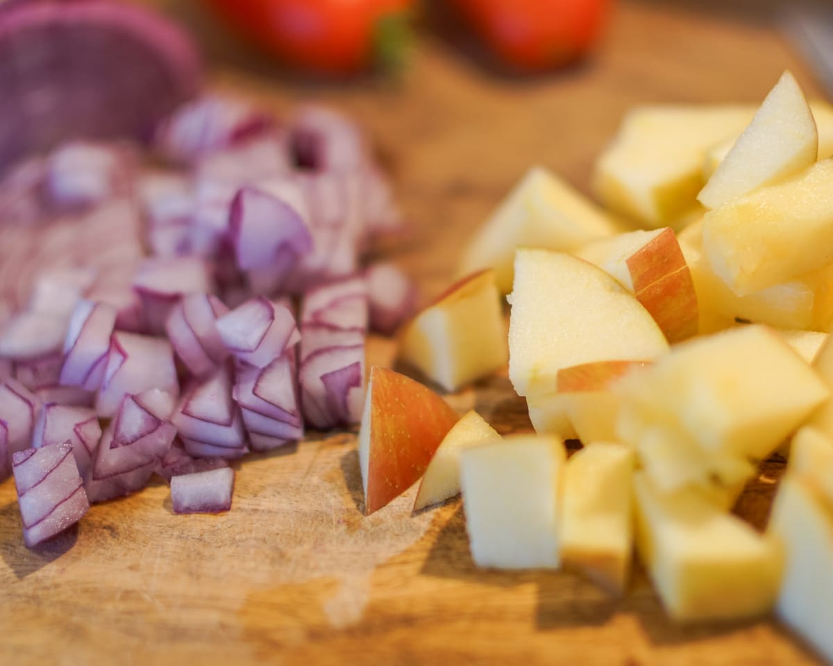 Diced red onion and apples.