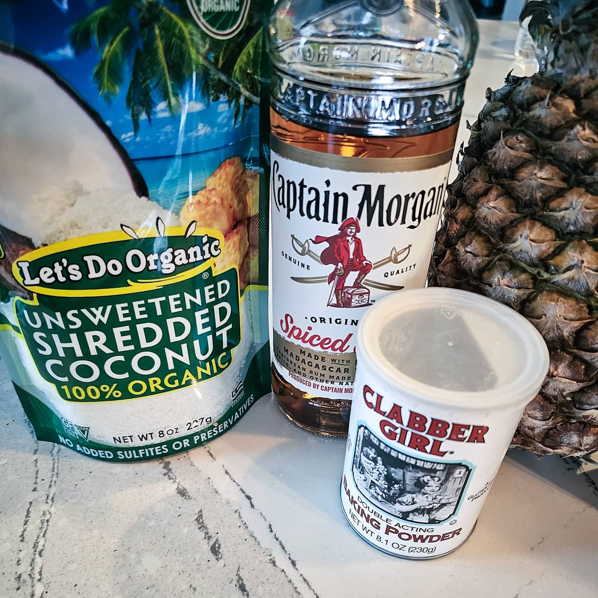 Pineapple, rum, baking powder, and shredded coconut.
