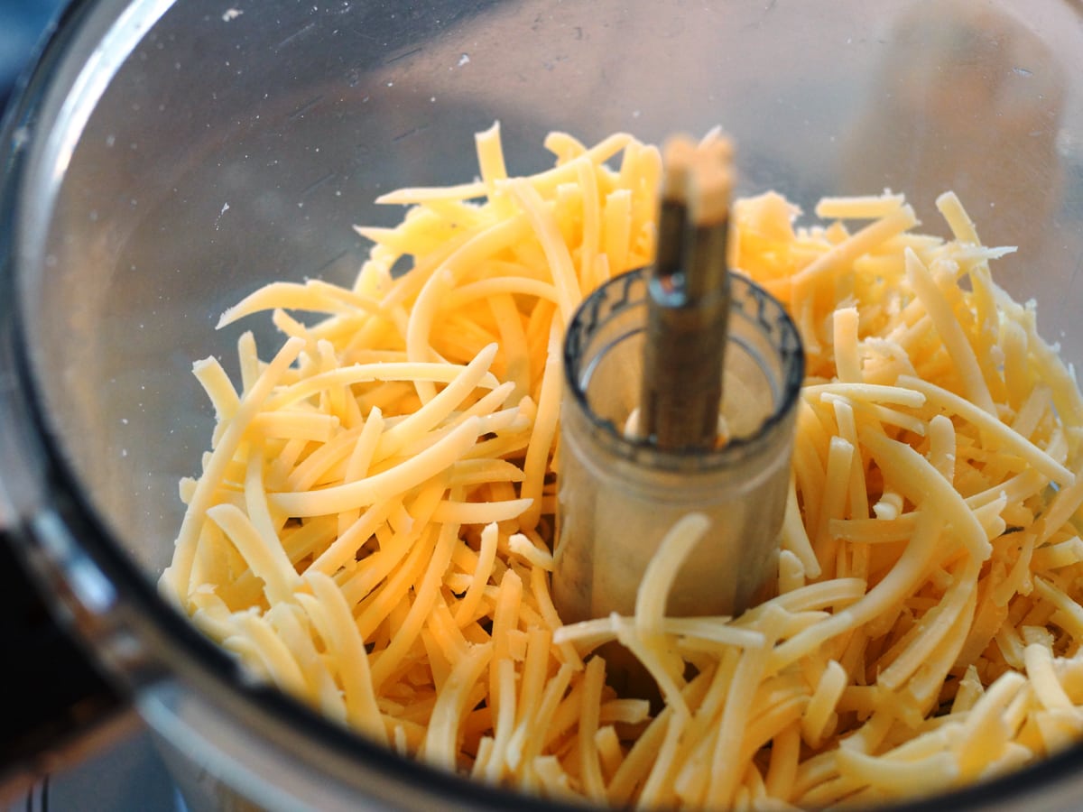 Asiago cheese in a food processor.
