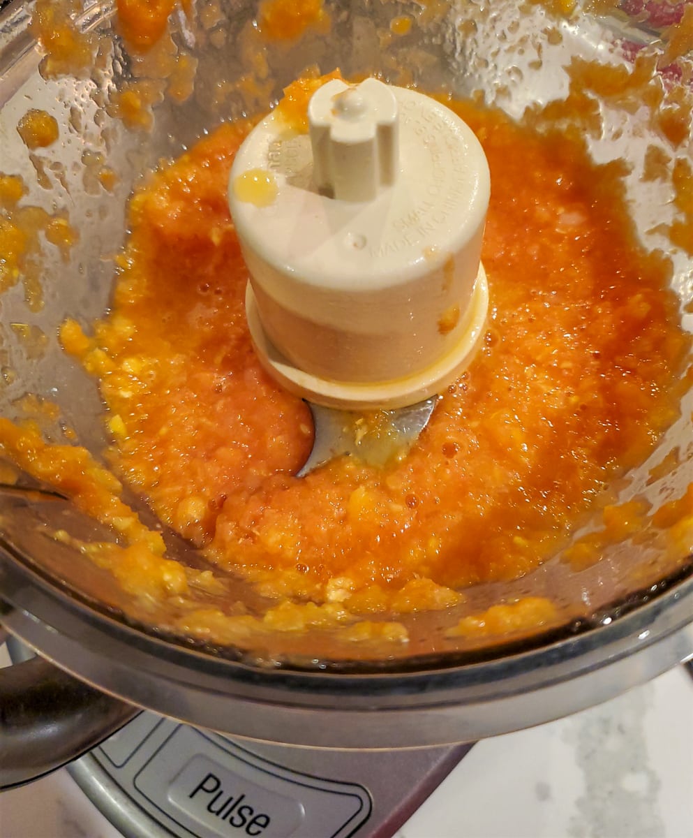 Making a blood orange puree.