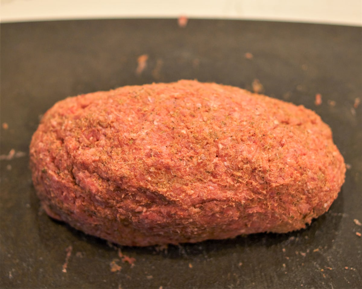 Seasoned loaf of ground beef for making a Halifax style donair.