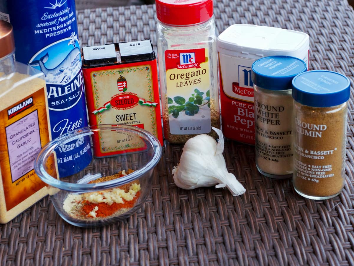 Assorted ingredients on a table for carne asada seasoning.