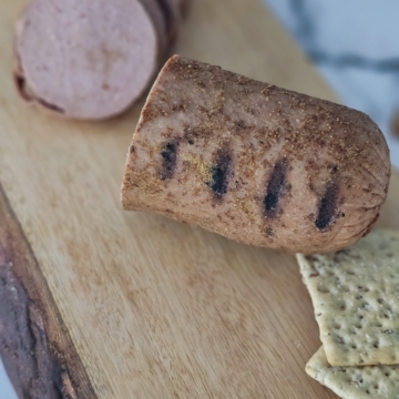 Sweet and spicy smoked bologna served with crackers.