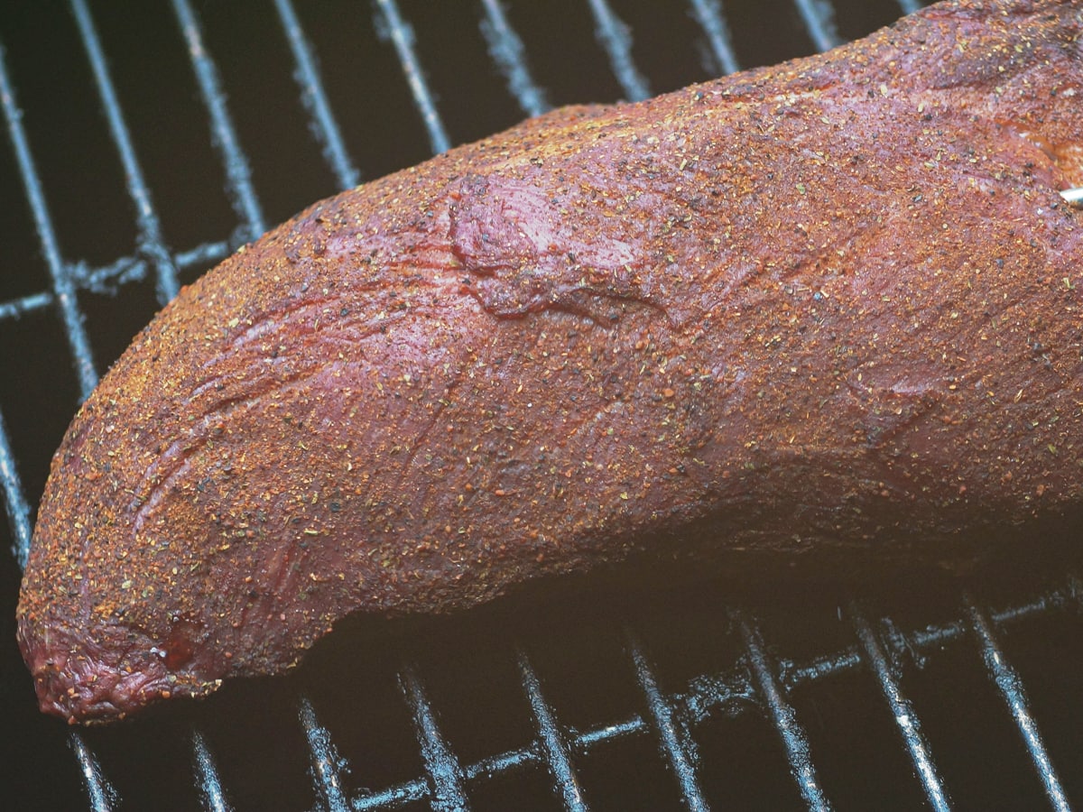 Smoked teres major on a grill.