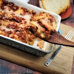 Homemade smoked lasagna with sweet Italian sausage and prosciutto.