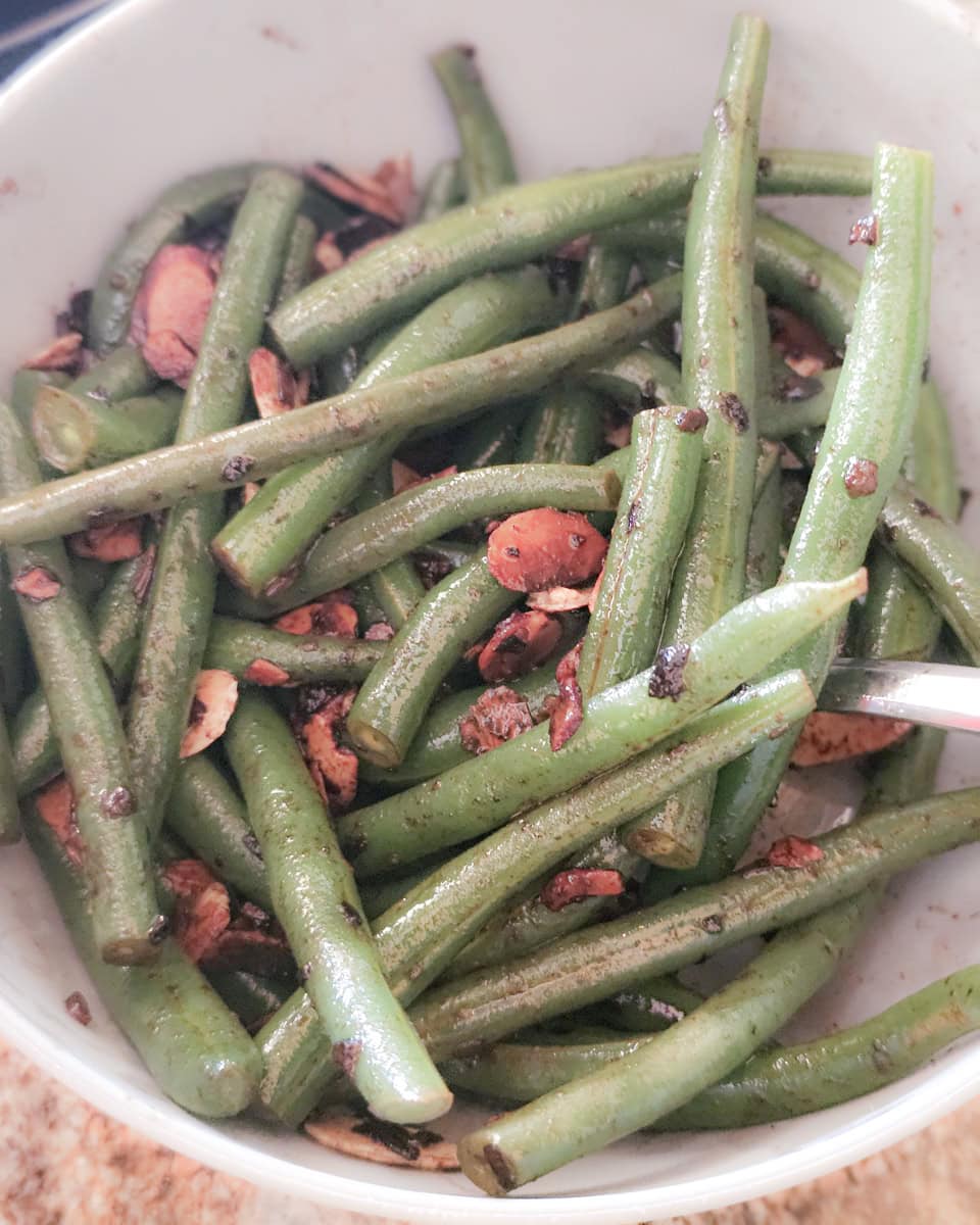 Sauteed green beans with toasted almonds.