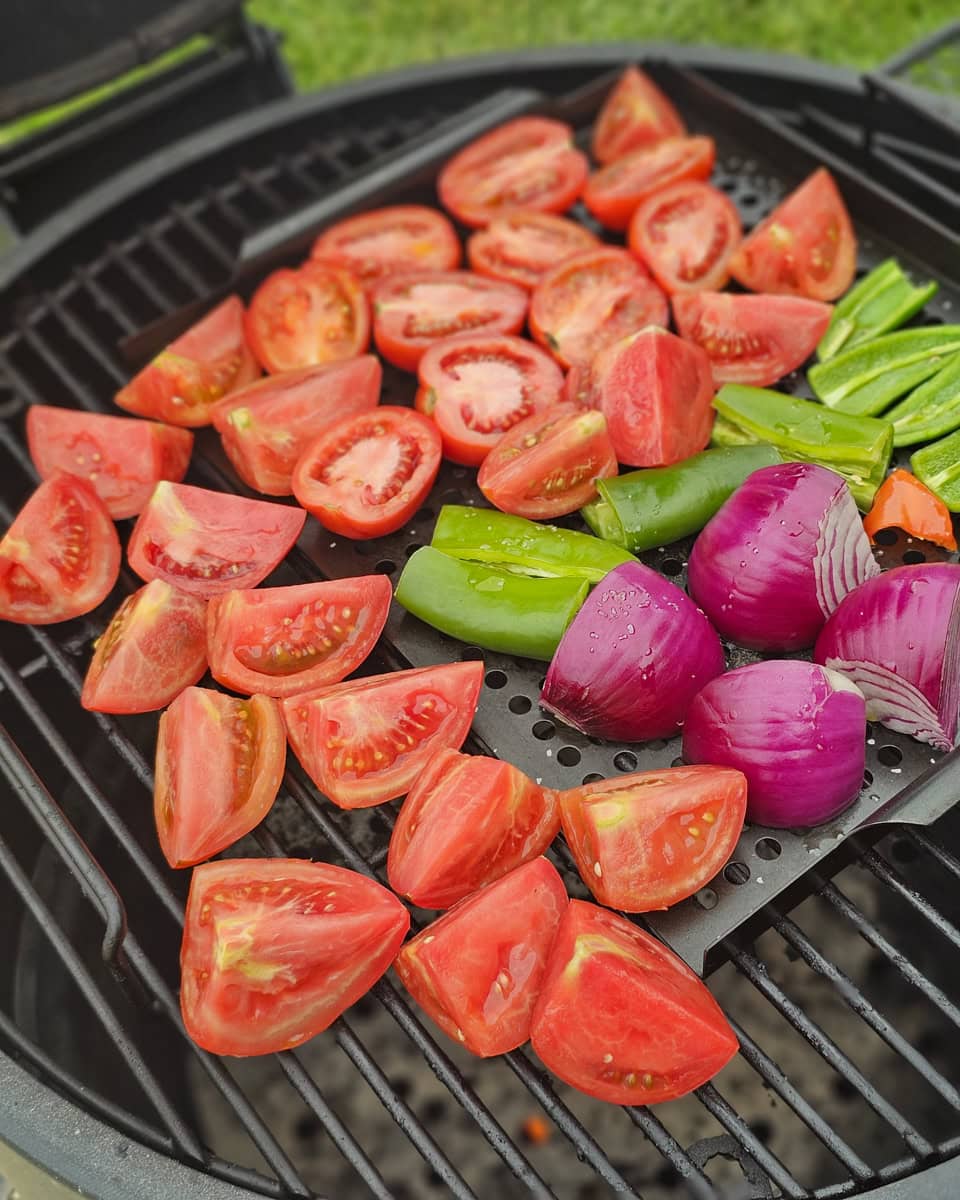 Smoking tomatoes, onions, and peppers for smoked salsa.