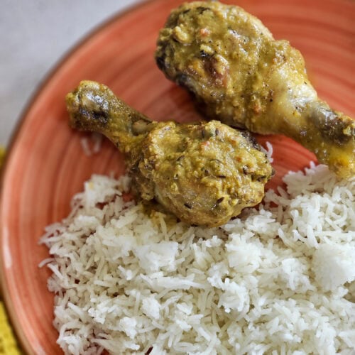 African Kuku Paka Chicken curry with rice on a plate.