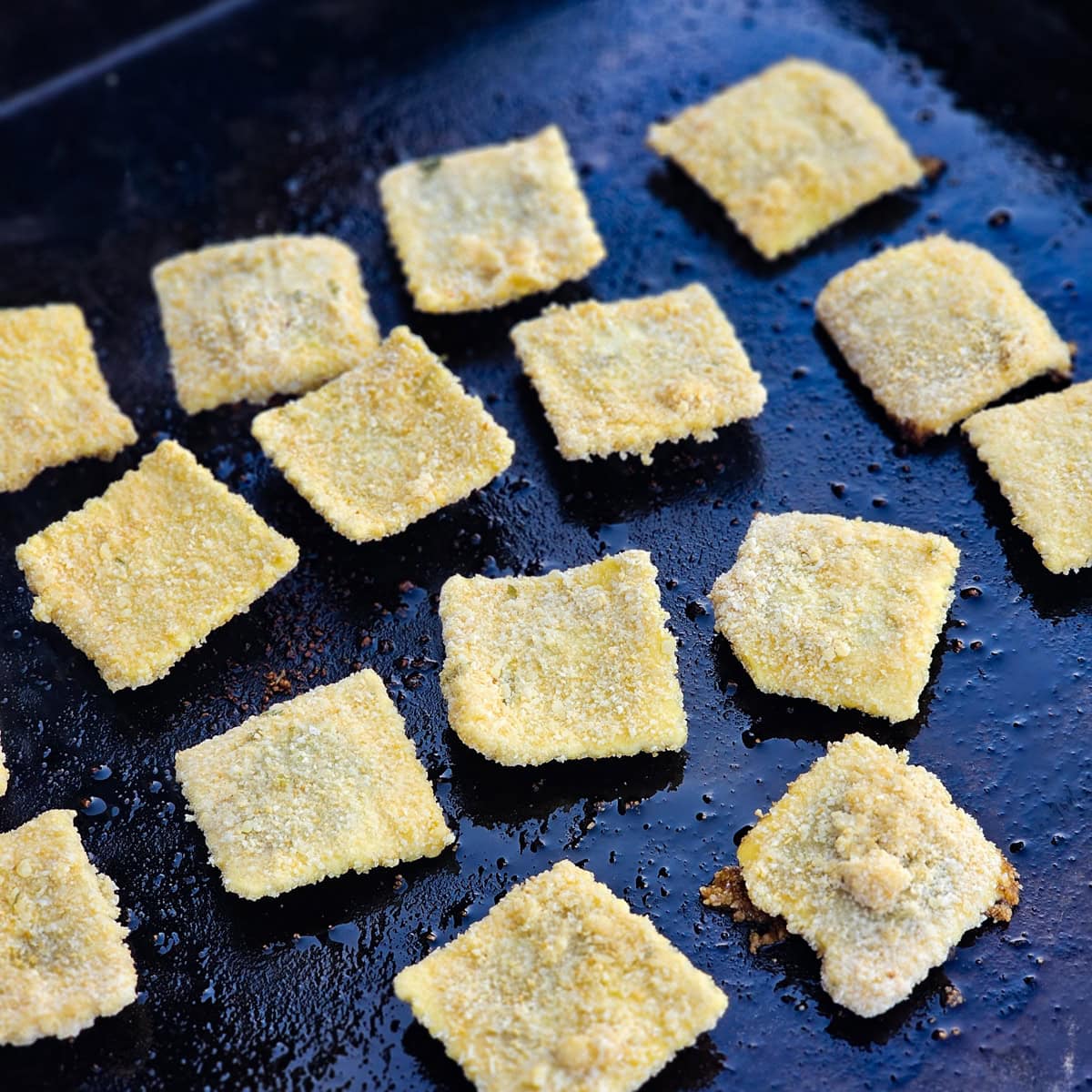 Cooking toasted ravioli on a Blackstone.