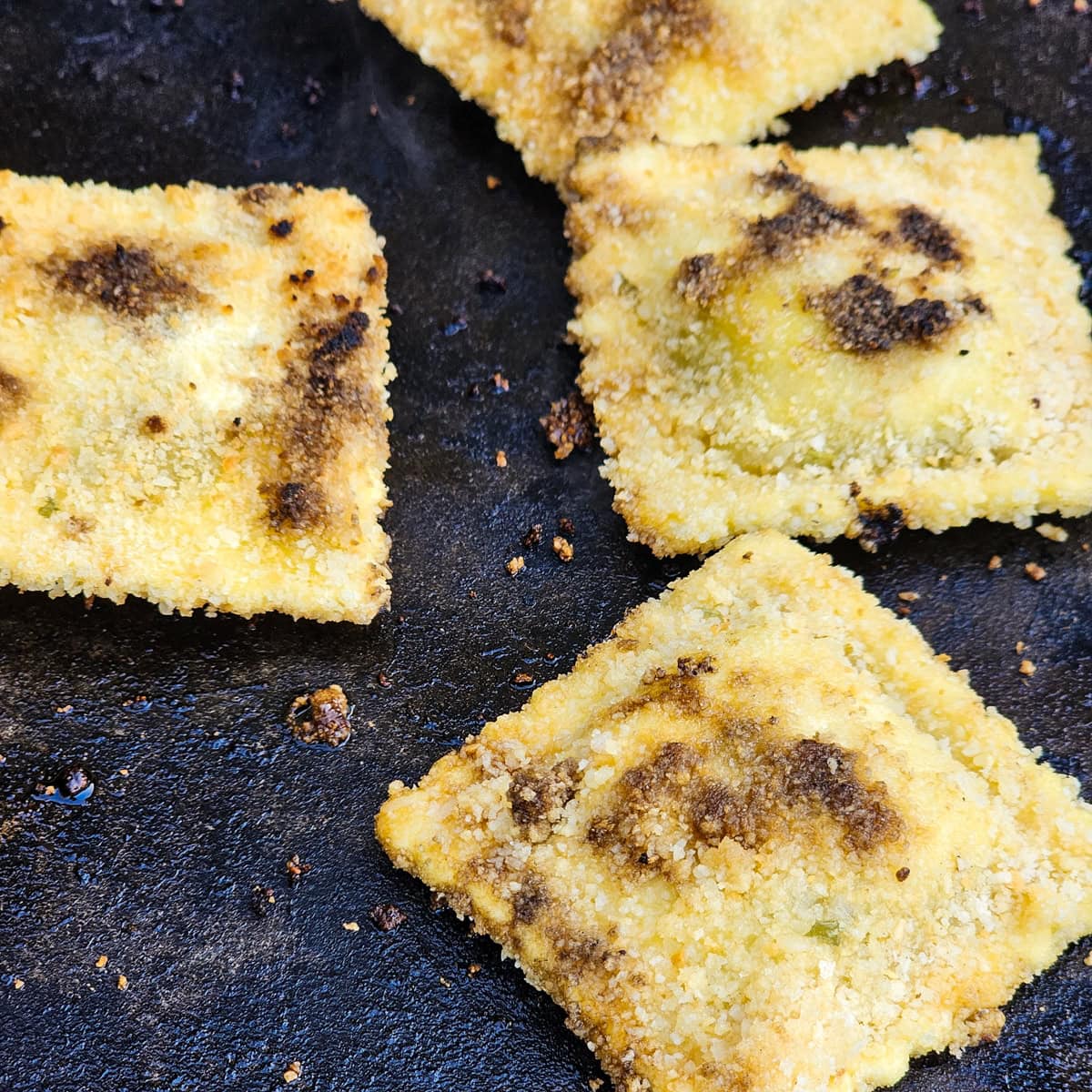 Toasted ravioli cooked on a Blackstone griddle.
