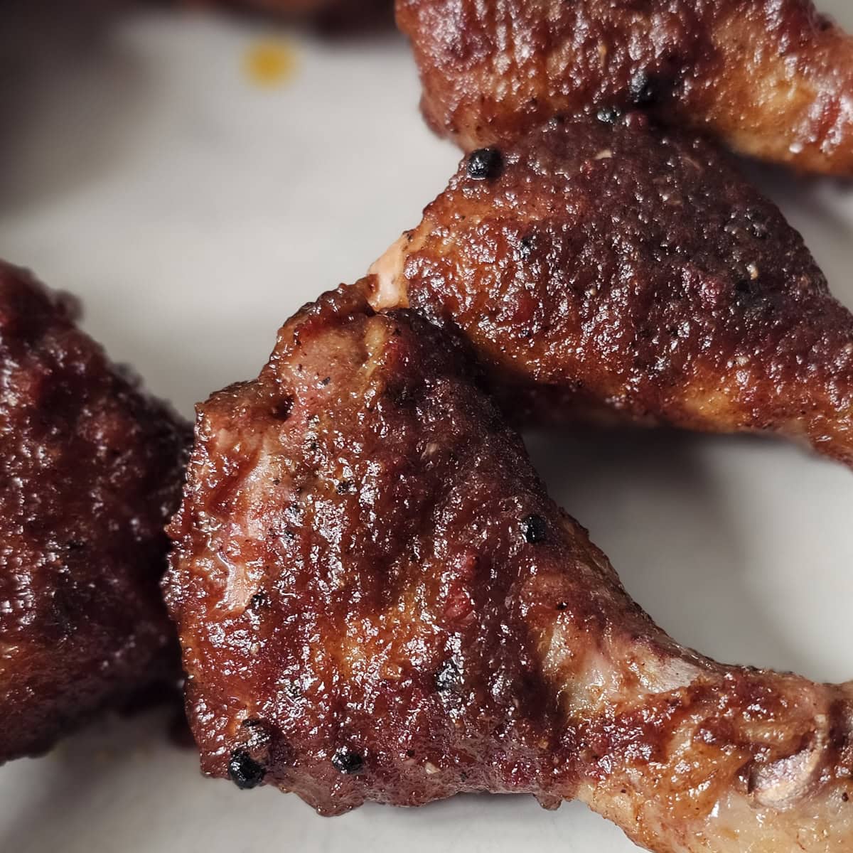 Smoked chicken legs with a homemade Jerk BBQ sauce.