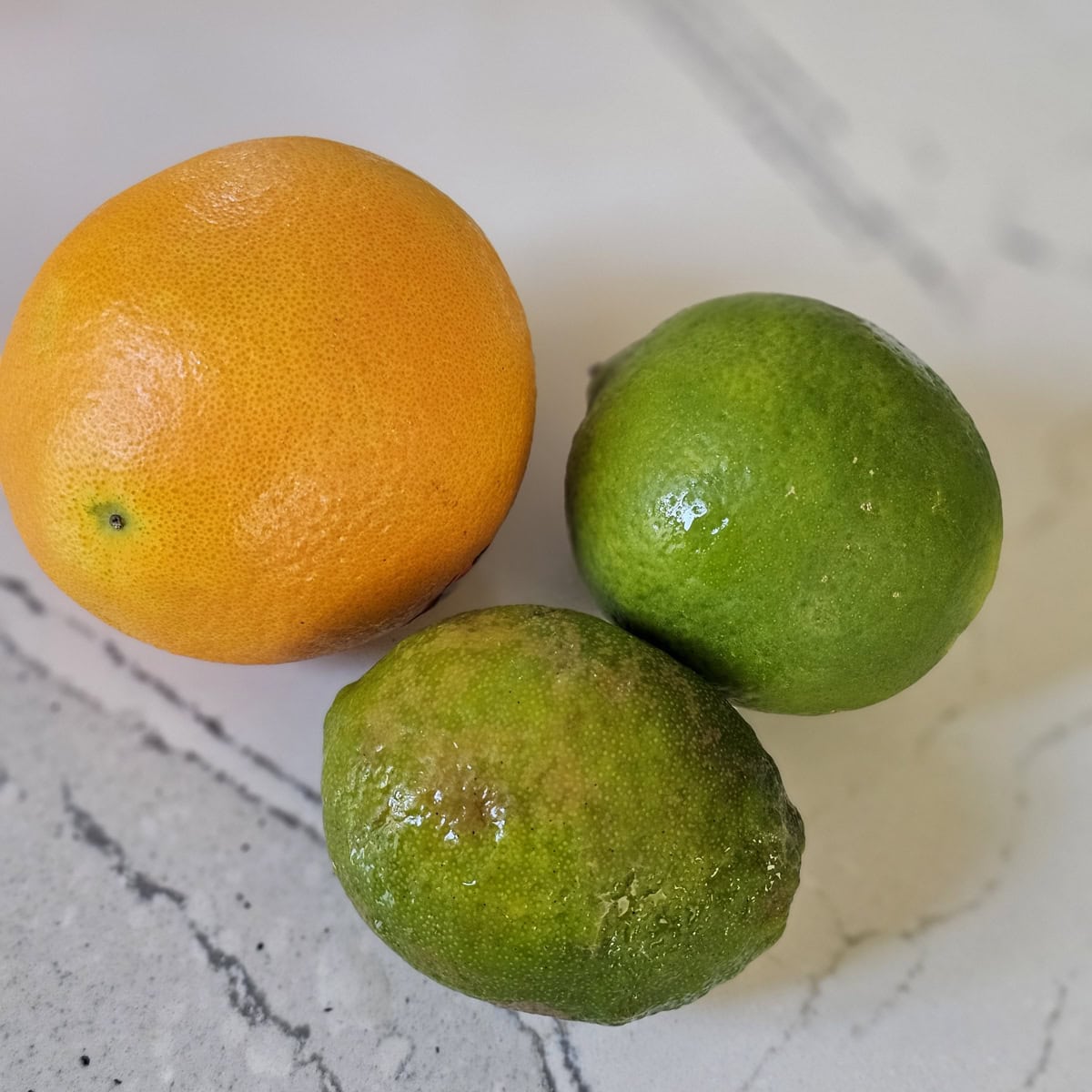 2 Limes and an orange