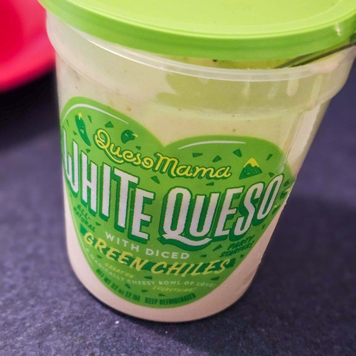 Container of white queso.