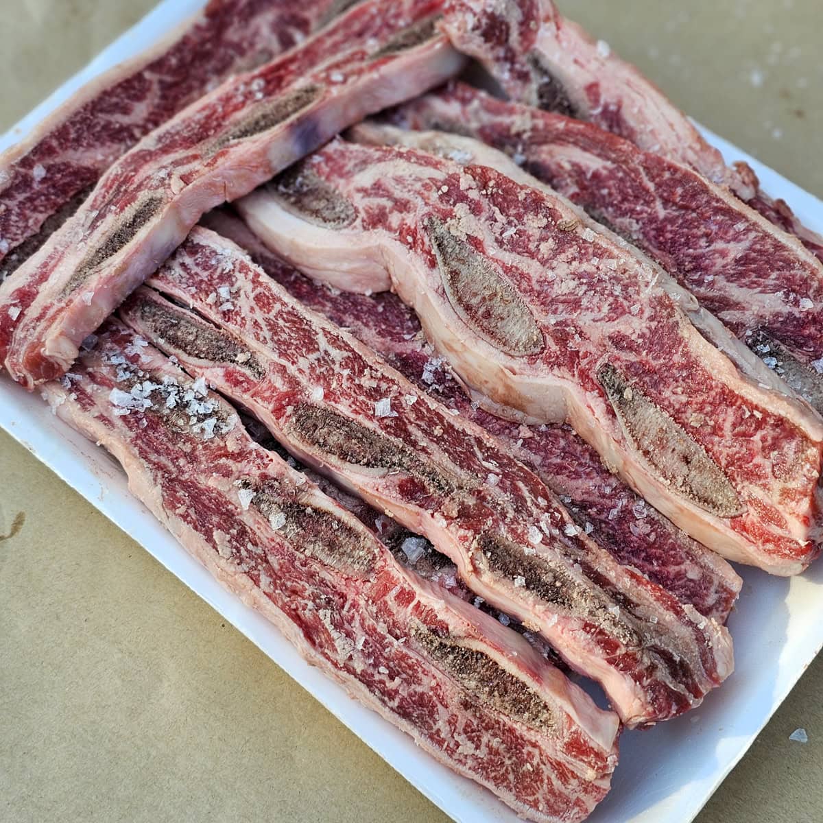 Beef short ribs seasoned with sea salt.