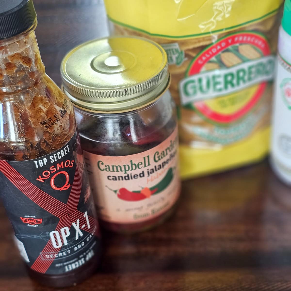 BBQ sauce, candied jalapenos, and corn tostada shells.