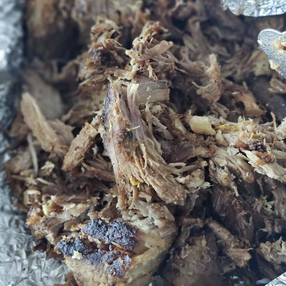 Pan of smoked pulled pork.