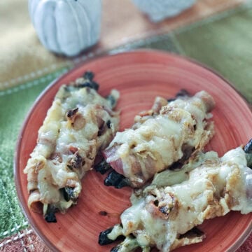 Baked, bacon wrapped green bean bundles topped with fried onions and Gruyere cheese.