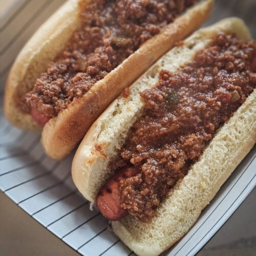 2 hot dogs topped with West Virginia style hot dog sauce.
