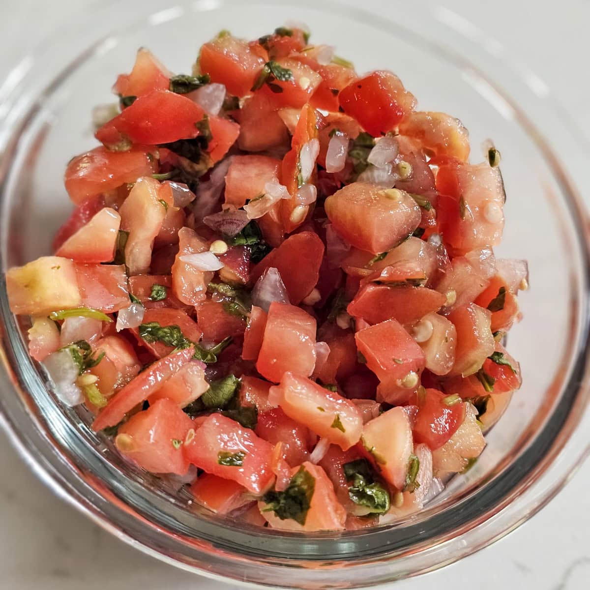 Container of pico de gallo.