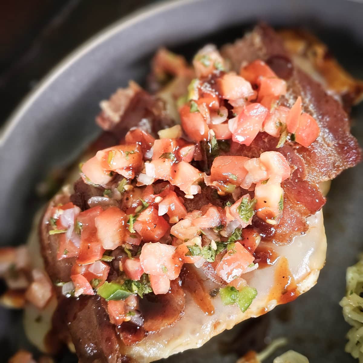 Chicken breast topped with BBQ sauce, cheese, bacon and pico de gallo.